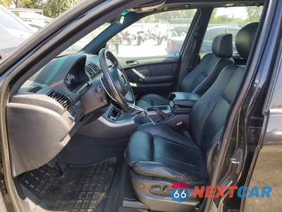 Zdjęcie 7 z 13 samochodu: 2004 BMW X5 4.8IS VIN:5UXFA93574LE81521 - miniatura