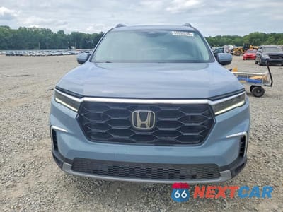 Piąte zdjęcie samochodu w środku: 2025 HONDA PILOT TOURING VIN:5FNYG1H76SB007755 - miniatura