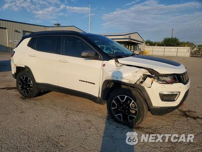 Czwarte zdjęcie samochodu z boku: 2021 JEEP COMPASS TRAILHAWK VIN:3C4NJDDB8MT562579 - miniatura