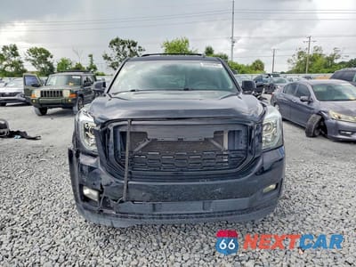 Piąte zdjęcie samochodu w środku: 2015 GMC YUKON SLT VIN:1GKS1BKC5FR243286 - miniatura