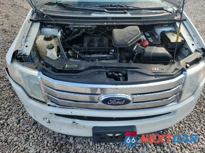 Zdjęcie 12 z 13 samochodu: 2009 FORD EDGE SEL VIN:2FMDK38C49BA87811 - miniatura