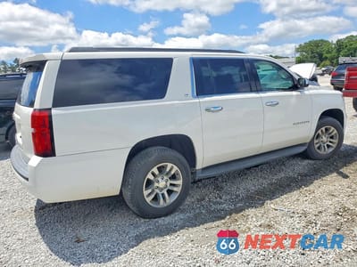Trzecie zdjęcie samochodu z tyłu: 2019 CHEVROLET SUBURBAN C1500 LT VIN:1GNSCHKCXKR178204 - miniatura