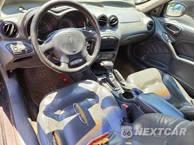 Zdjęcie 8 z 12 samochodu: 2003 PONTIAC GRAND AM GT VIN:1G2NW12E83C246210 - miniatura