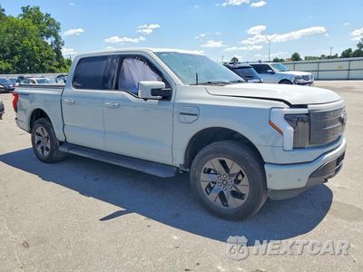 Czwarte zdjęcie samochodu z boku: 2023 FORD F150 LIGHTNING PRO VIN:1FT6W1EV7PWG45058 - miniatura