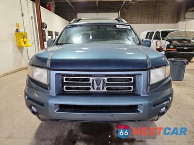 Piąte zdjęcie samochodu w środku: 2006 HONDA RIDGELINE RTL VIN:2HJYK16536H505228 - miniatura