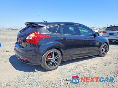 Trzecie zdjęcie samochodu z tyłu: 2014 FORD FOCUS ST VIN:1FADP3L94EL402625 - miniatura