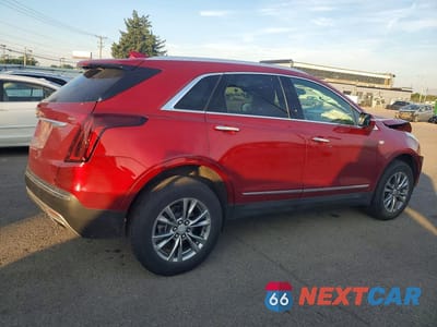 Trzecie zdjęcie samochodu z tyłu: 2021 CADILLAC XT5 PREMIUM LUXURY VIN:1GYKNDRS9MZ108120 - miniatura