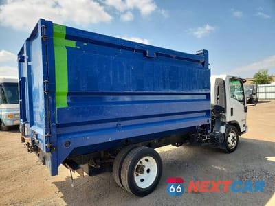 Czwarte zdjęcie samochodu z boku: 2016 ISUZU NPR HD DUMP TRUCK VIN:54DC4W1B6GS806195 - miniatura