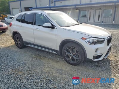 Czwarte zdjęcie samochodu z boku: 2019 BMW X1 XDRIVE28I VIN:WBXHT3C54K3H35834 - miniatura
