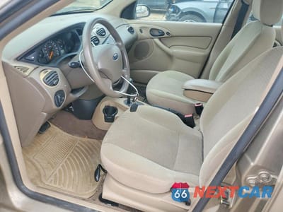Zdjęcie 7 z 12 samochodu: 2003 FORD FOCUS SE VIN:1FAFP34P33W309550 - miniatura