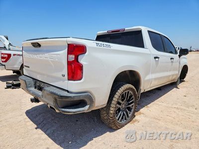 Trzecie zdjęcie samochodu z tyłu: 2023 CHEVROLET SILVERADO K1500 LT TRAIL BOSS VIN:3GCUDFED9PG212230 - miniatura