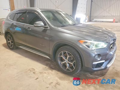 Czwarte zdjęcie samochodu z boku: 2016 BMW X1 XDRIVE28I VIN:WBXHT3C33G5E52741 - miniatura