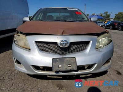 Piąte zdjęcie samochodu w środku: 2009 TOYOTA COROLLA LE VIN:1NXBU40EX9Z069781 - miniatura