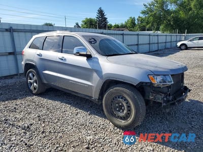 Czwarte zdjęcie samochodu z boku: 2014 JEEP GRAND CHEROKEE LIMITED VIN:1C4RJFBG9EC441147 - miniatura