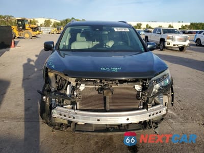 Piąte zdjęcie samochodu w środku: 2017 HONDA PILOT TOURING VIN:5FNYF5H96HB019120 - miniatura
