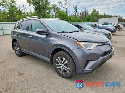 Czwarte zdjęcie samochodu z boku: 2016 TOYOTA RAV4 VIN:2T3BFREV0GW537084 - miniatura