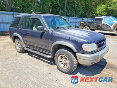 Czwarte zdjęcie samochodu z boku: 2000 FORD EXPLORER SPORT VIN:1FMYU60EXYUA98640 - miniatura