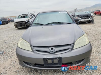 Piąte zdjęcie samochodu w środku: 2004 HONDA CIVIC LX VIN:2HGES16574H610795 - miniatura