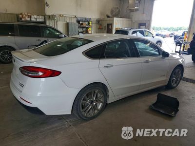 Trzecie zdjęcie samochodu z tyłu: 2019 FORD FUSION TITANIUM VIN:3FA6P0RU2KR106695 - miniatura