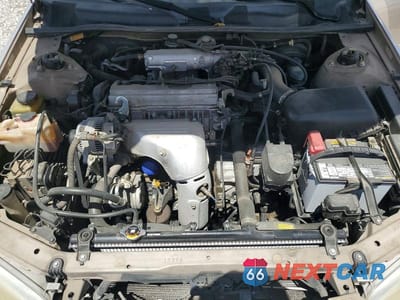 Zdjęcie 11 z 12 samochodu: 1999 TOYOTA CAMRY LE VIN:4T1BG22KXXU418370 - miniatura