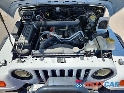 Zdjęcie 11 z 12 samochodu: 2004 JEEP WRANGLER X VIN:1J4FA39S94P700586 - miniatura