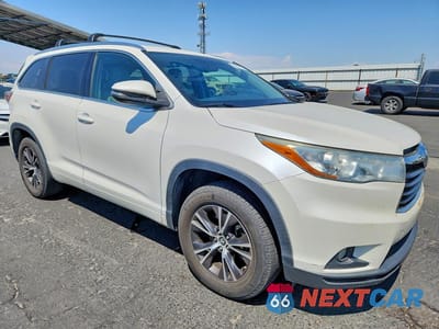 Czwarte zdjęcie samochodu z boku: 2016 TOYOTA HIGHLANDER XLE VIN:5TDKKRFH6GS126049 - miniatura
