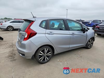 Trzecie zdjęcie samochodu z tyłu: 2018 HONDA FIT EX VIN:3HGGK5H83JM711207 - miniatura