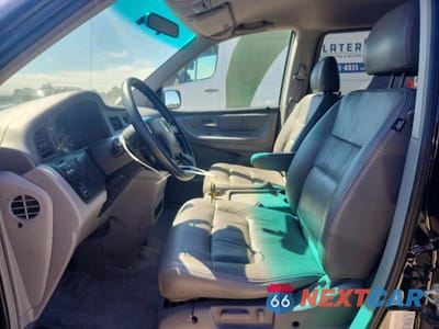 Zdjęcie 7 z 13 samochodu: 2004 HONDA ODYSSEY EXL VIN:5FNRL18024B117871 - miniatura