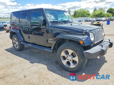Czwarte zdjęcie samochodu z boku: 2017 JEEP WRANGLER UNLIMITED SAHARA VIN:1C4HJWEG7HL722701 - miniatura