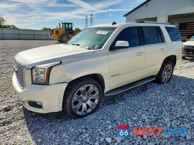 2015 GMC YUKON DENALI 1GKS2CKJ7FR273441 - główne zdjęcie licytacji z USA - miniatura