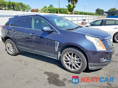 Czwarte zdjęcie samochodu z boku: 2014 CADILLAC SRX PREMIUM COLLECTION VIN:3GYFNDE30ES530694 - miniatura