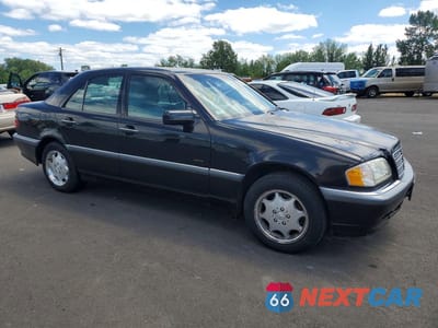 Czwarte zdjęcie samochodu z boku: 1999 MERCEDES-BENZ C 230 VIN:WDBHA24G6XA795741 - miniatura