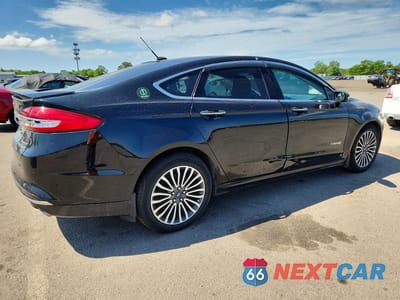 Trzecie zdjęcie samochodu z tyłu: 2018 FORD FUSION TITANIUM VIN:3FA6P0RU5JR206790 - miniatura
