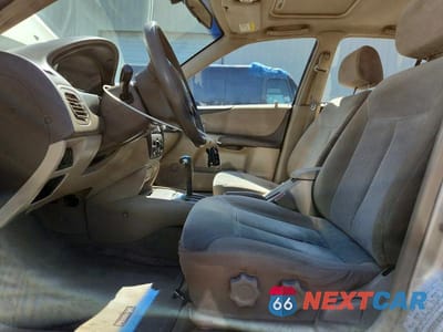 Zdjęcie 7 z 12 samochodu: 2002 MAZDA PROTEGE DX VIN:JM1BJ225420536706 - miniatura