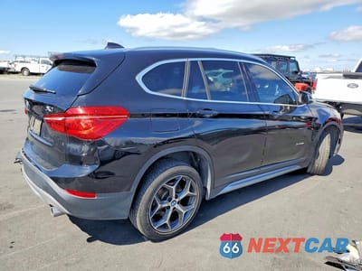 Trzecie zdjęcie samochodu z tyłu: 2018 BMW X1 XDRIVE28I VIN:WBXHT3C36J5K20462 - miniatura