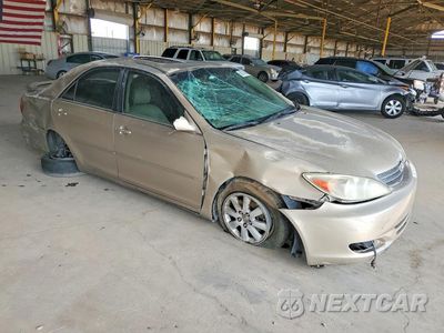 Czwarte zdjęcie samochodu z boku: 2003 TOYOTA CAMRY XLE V6 VIN:4T1BF30K23U039207 - miniatura