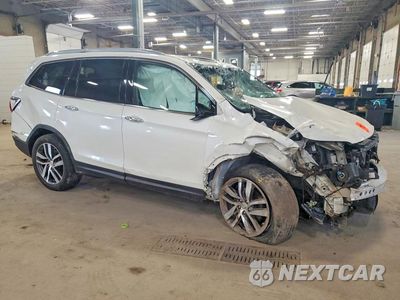 Czwarte zdjęcie samochodu z boku: 2017 HONDA PILOT TOURING VIN:5FNYF6H96HB023416 - miniatura