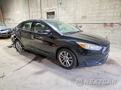 Czwarte zdjęcie samochodu z boku: 2016 FORD FOCUS SE VIN:1FADP3F26GL221219 - miniatura