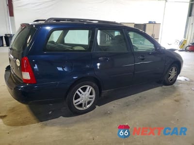 Trzecie zdjęcie samochodu z tyłu: 2001 FORD FOCUS SE VIN:1FAFP36371W254303 - miniatura