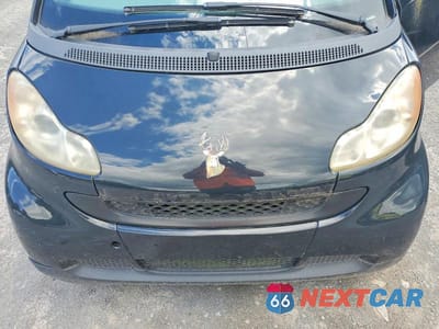 Zdjęcie 11 z 12 samochodu: 2009 SMART FORTWO PURE VIN:WMEEJ31X49K312700 - miniatura