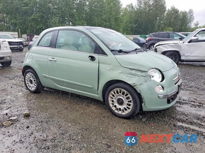 Czwarte zdjęcie samochodu z boku: 2014 FIAT 500 LOUNGE VIN:3C3CFFCR7ET285111 - miniatura