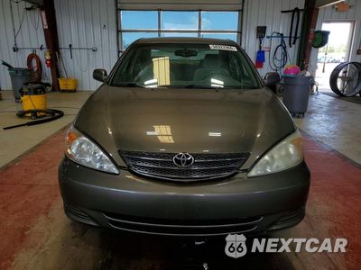 Piąte zdjęcie samochodu w środku: 2003 TOYOTA CAMRY LE VIN:4T1BE30K33U758372 - miniatura