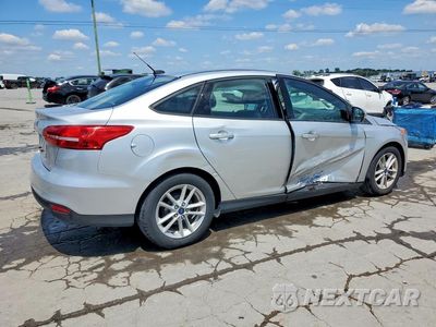 Trzecie zdjęcie samochodu z tyłu: 2018 FORD FOCUS SE VIN:1FADP3F27JL221530 - miniatura
