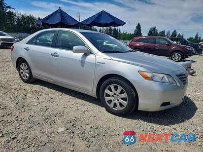 Czwarte zdjęcie samochodu z boku: 2009 TOYOTA CAMRY HYBRID BASE VIN:JTNBB46K393049803 - miniatura