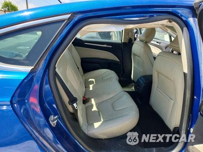 Zdjęcie 10 z 12 samochodu: 2017 FORD FUSION TITANIUM HEV VIN:3FA6P0RU2HR399992 - miniatura