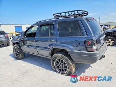 Drugie zdjęcie samochodu z przodu: 2002 JEEP GRAND CHEROKEE LAREDO VIN:1J4GW48S62C223679 - miniatura