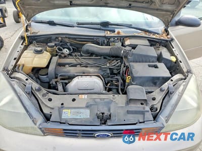 Zdjęcie 11 z 12 samochodu: 2003 FORD FOCUS SE COMFORT VIN:1FAHP34393W206509 - miniatura