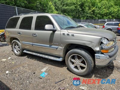 Czwarte zdjęcie samochodu z boku: 2003 CHEVROLET TAHOE K1500 VIN:1GNEK13Z63R140321 - miniatura