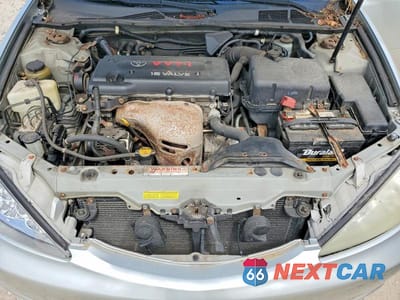 Zdjęcie 11 z 12 samochodu: 2003 TOYOTA CAMRY LE VIN:4T1BE32K03U665922 - miniatura