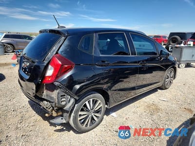 Trzecie zdjęcie samochodu z tyłu: 2019 HONDA FIT EX VIN:3HGGK5H85KM747627 - miniatura